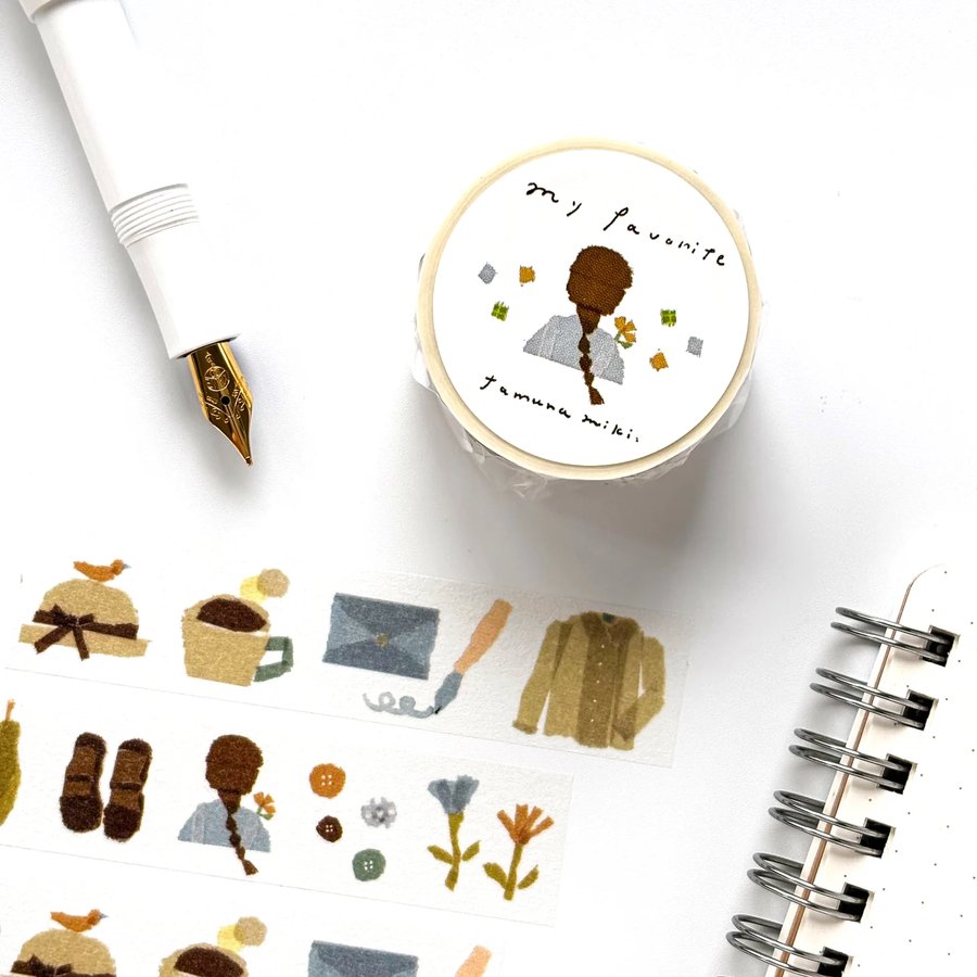 Miki Tamura “my favorite” washi tape roll with strips showing a braided-hair girl, a straw hat, coffee cup, envelope, shoes and flowers